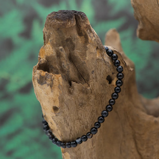 Edelstein-Armband aus 4 mm schwarzem Achat – schützt und stabilisiert.
