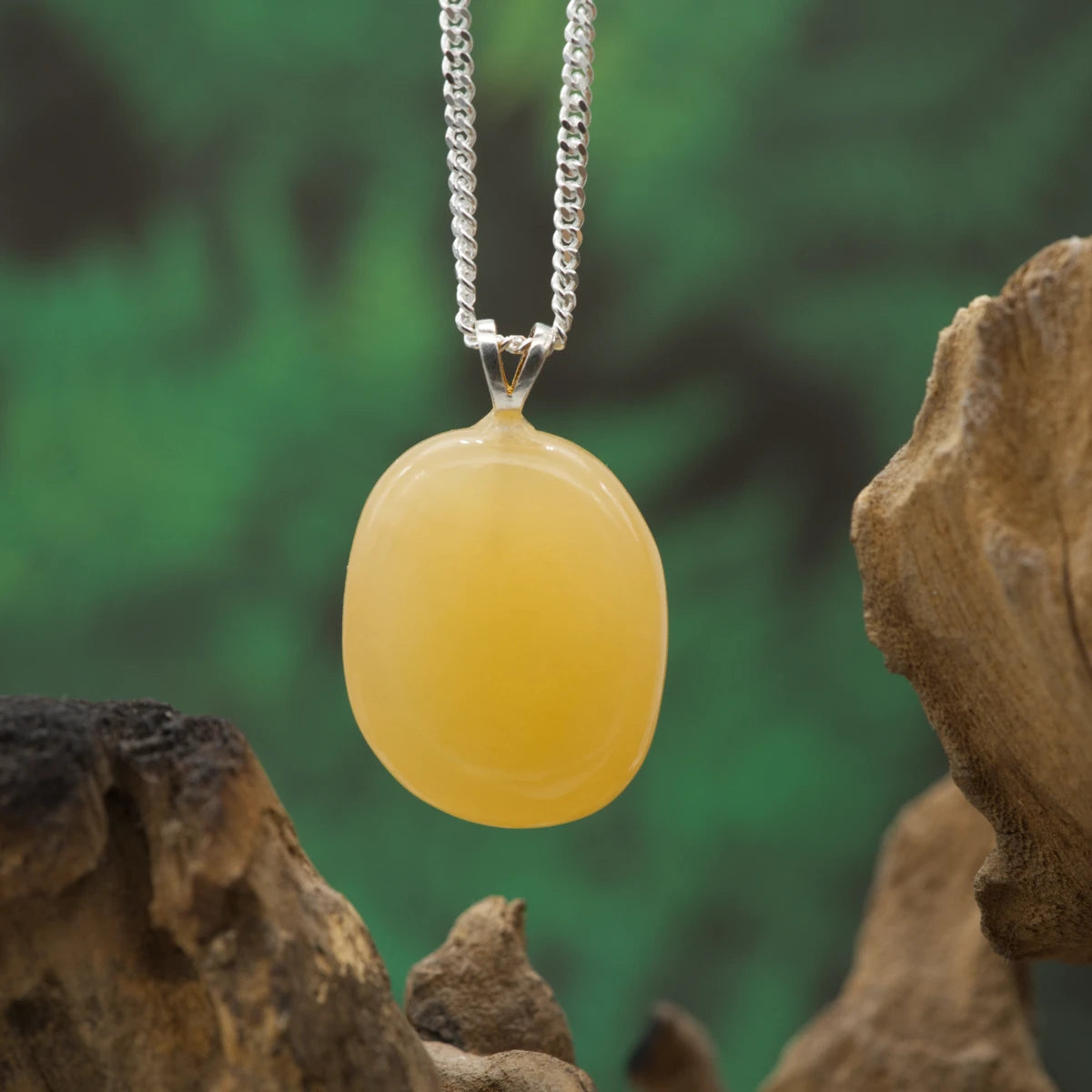 Orange-gelber Calcit-Anhänger – aktiviert Lebensenergie, Kreativität und Freude.