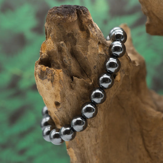 Edelstein-Armband aus 10 mm Hämatin-Perlen mit metallischem Glanz – stärkt Erdung und innere Kraft.