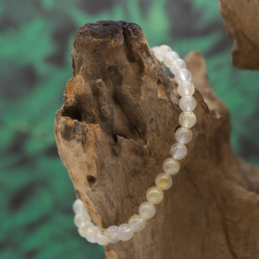Edelstein-Armband aus 6 mm Rutilquarz – fördert Inspiration und Energiefluss.