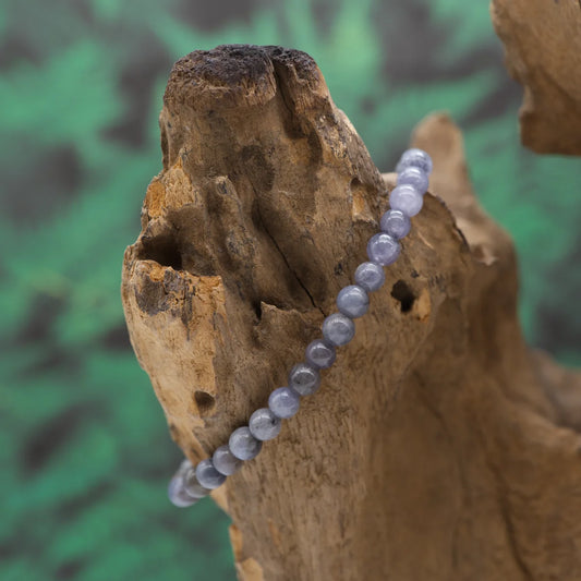 Edelstein-Armband aus 6 mm Tansanit – klärt Geist und stärkt spirituelles Bewusstsein.