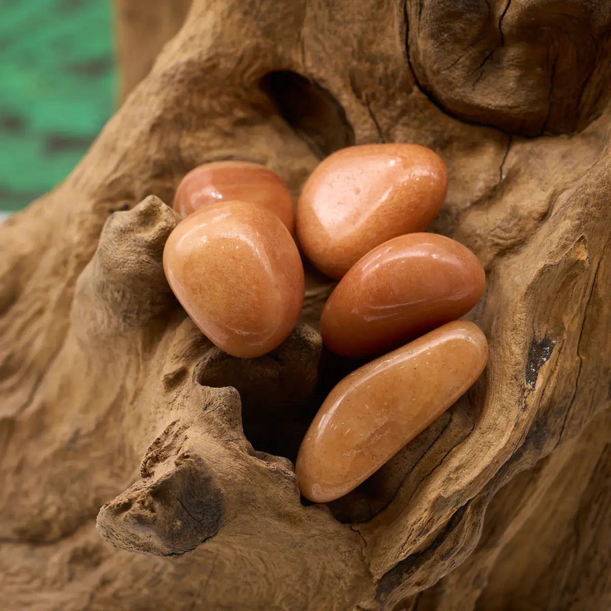 Sanft orangefarbener Aventurin-Trommelstein – schenkt Optimismus und Vertrauen.