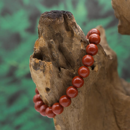 Edelstein-Armband aus 8 mm rotem Jaspis – stärkt Willenskraft und Erdung.