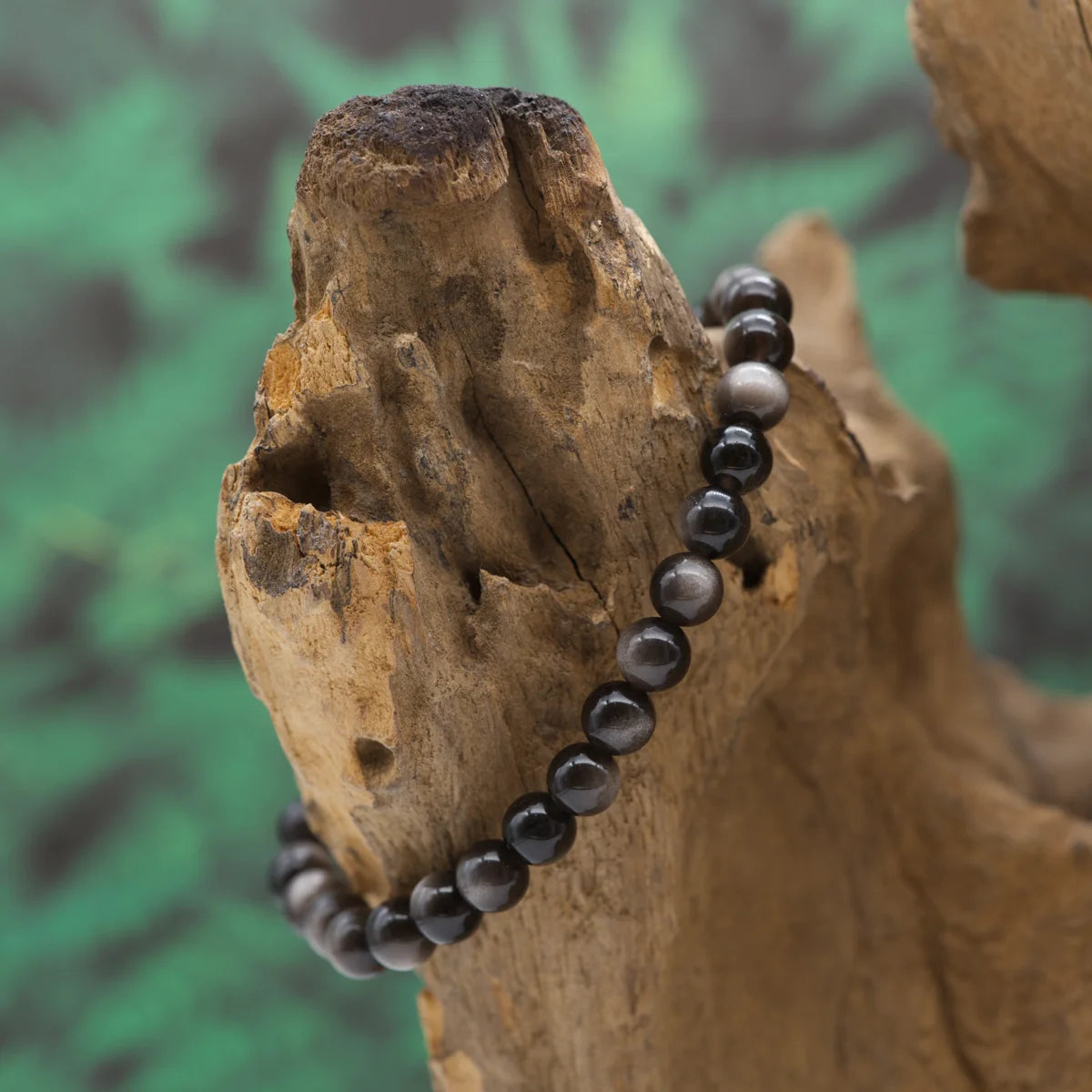 Edelstein-Armband aus 6 mm Silberobsidian – stärkt Schutz und Selbsterkenntnis.