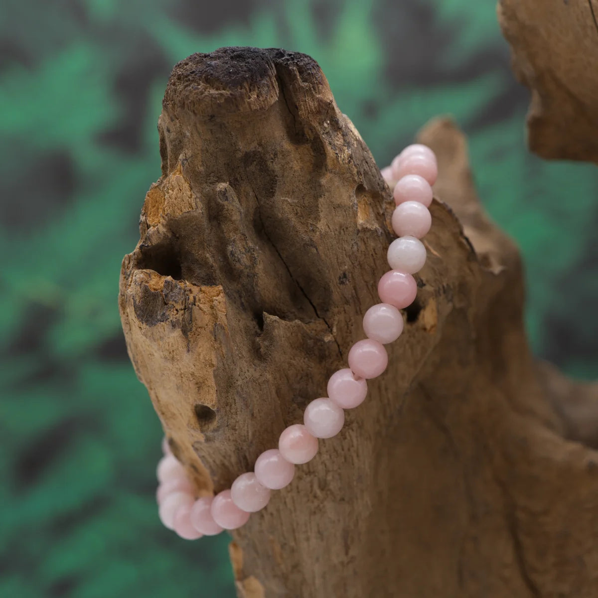 Edelstein-Armband aus 6 mm pinkem Andenopal – fördert Mitgefühl und Herzenergie.