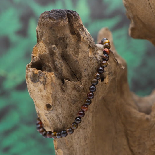 Edelstein-Armband aus 4 mm Tigerauge-Mix – bringt Balance und Schutz.